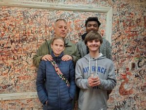 My foster parents Dan and Vincee on the left, and me and my foster brother Maliek on the right at an escape room for my 16th birthday. (submitted by Anthony Rey)