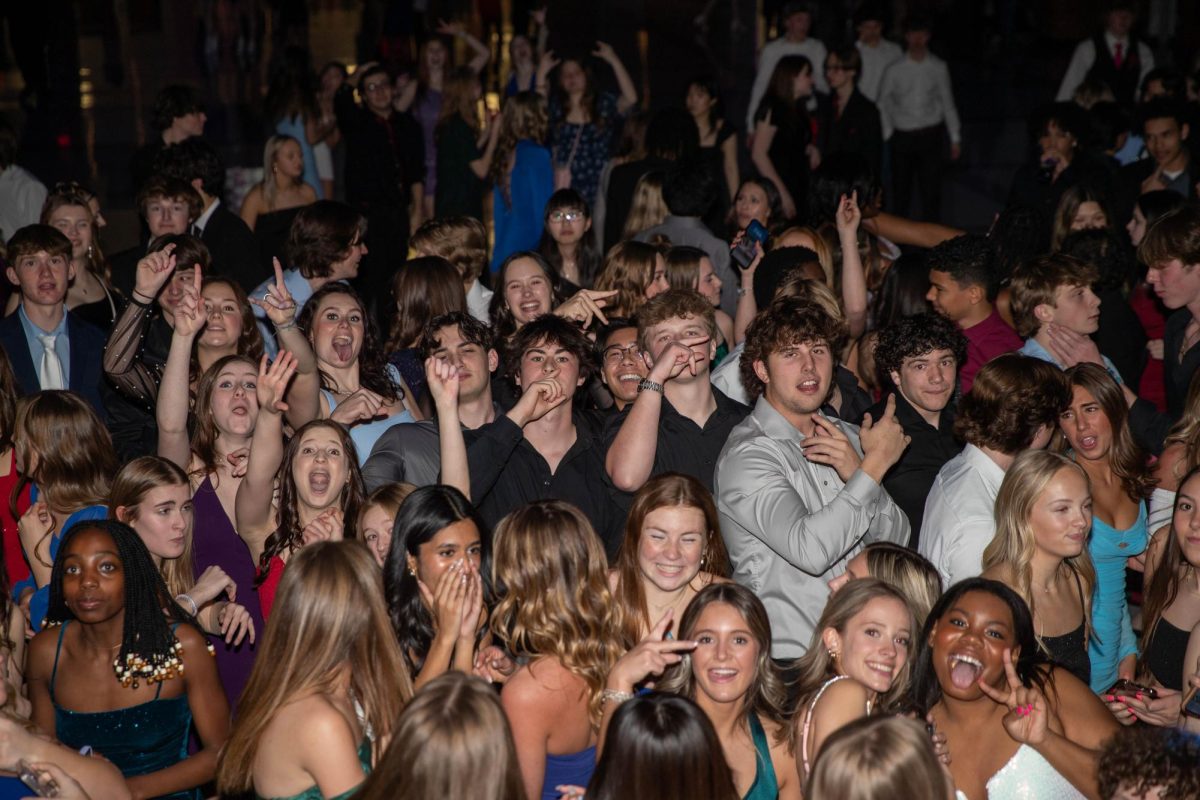 While dancing to the beats played by Mr. Wheeler, many students stopped and posed for the camera during the winter formal dance. With a theme of A Night With the Lights students attended on Feb. 24 to enjoy the night with the lights.