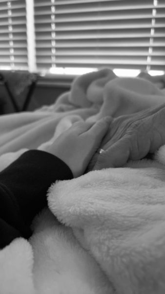 In his final hours, I got to hold hands with my grandpa for the last time.