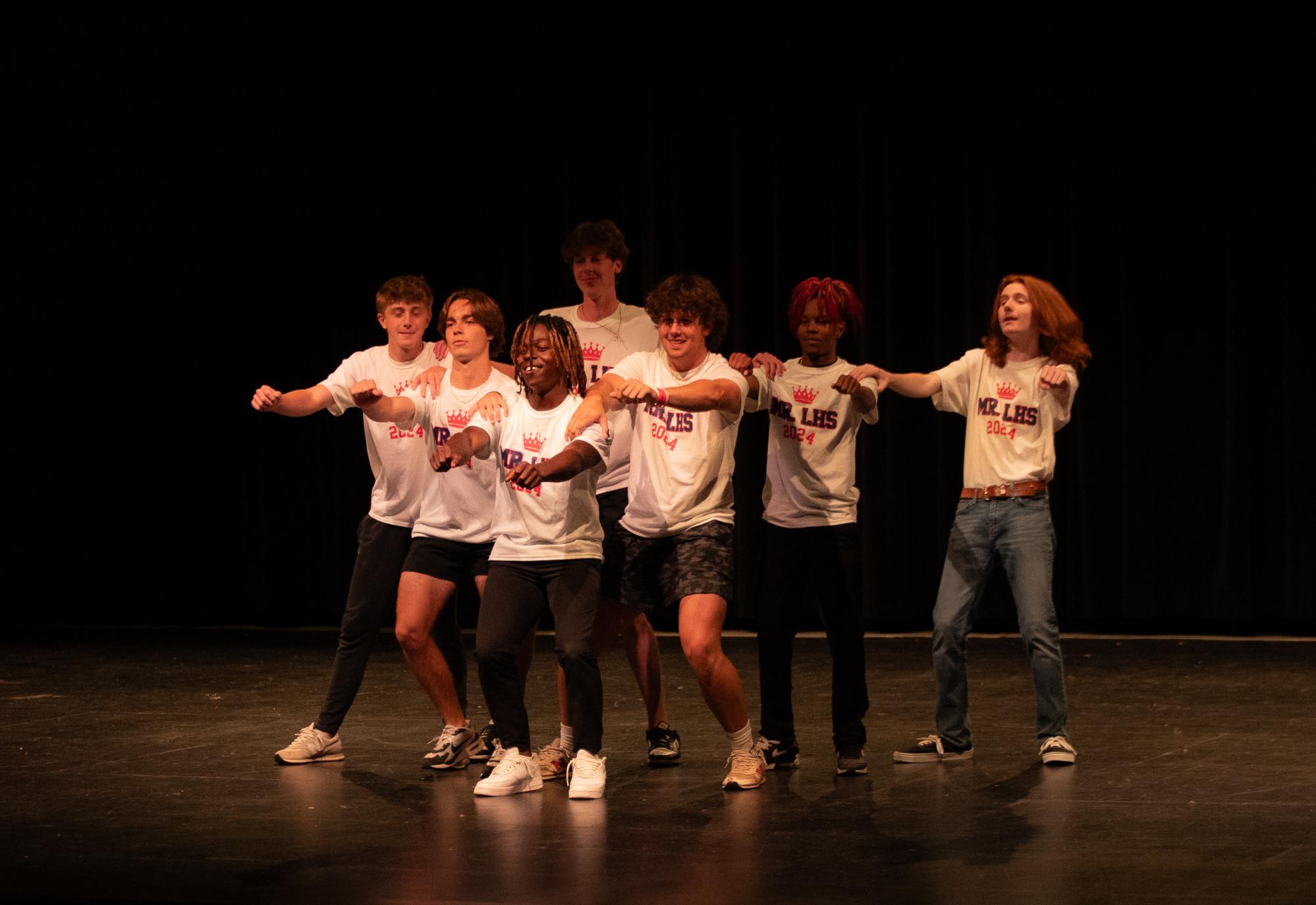 The seven runner ups for Mr. LHS open the show with a group dance to show off what is to come during the show.