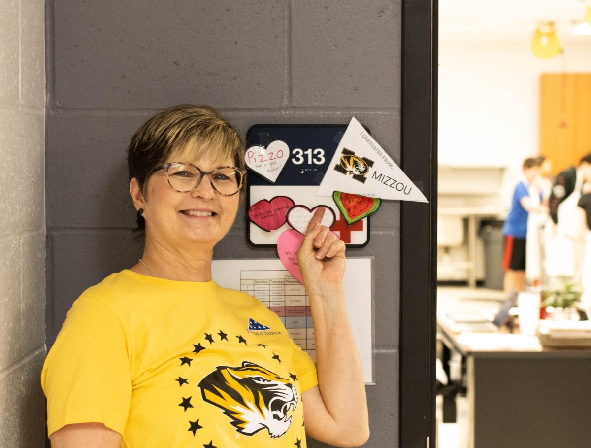 Ms. Pizzo got her degree at Mizzou and could not be happier to represent the Tigers.