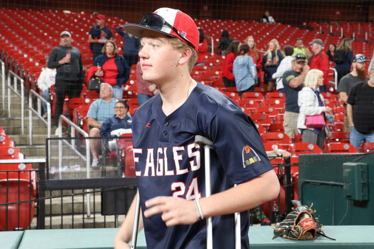 Cooper Freand (11) makes his wait out to shake hands with the other team. 