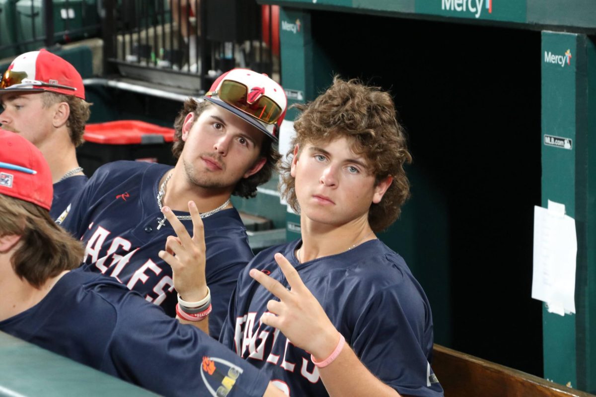 Noah Kuehner and Drew Smith strike pose after taking the lead against Parkway Central. 