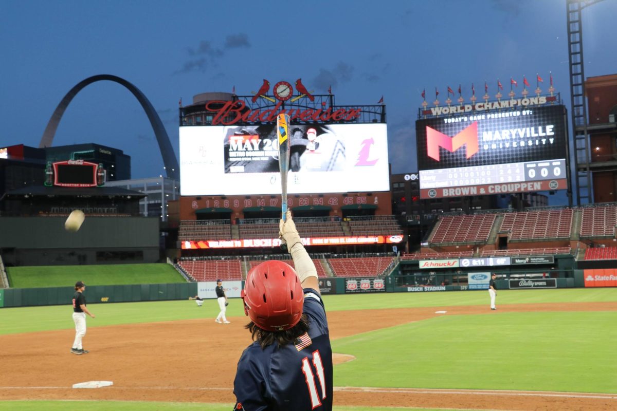 Javier Pasillas calls his shot as he approaches the plate. 