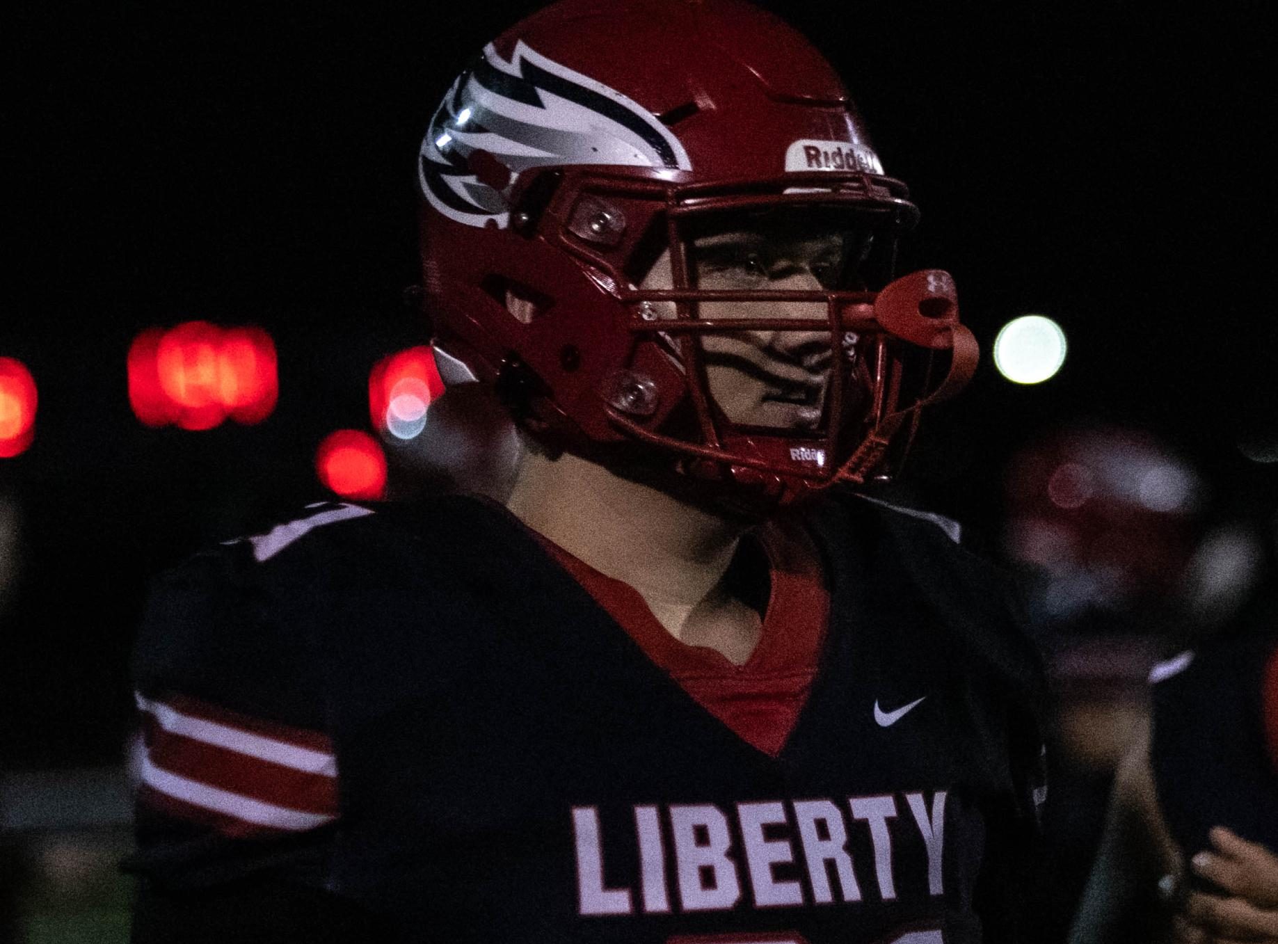 Shaun Dobratz (12) stands on sidelines as he intensely watches the football game against Francis Howell Central on Friday, Aug, 30.