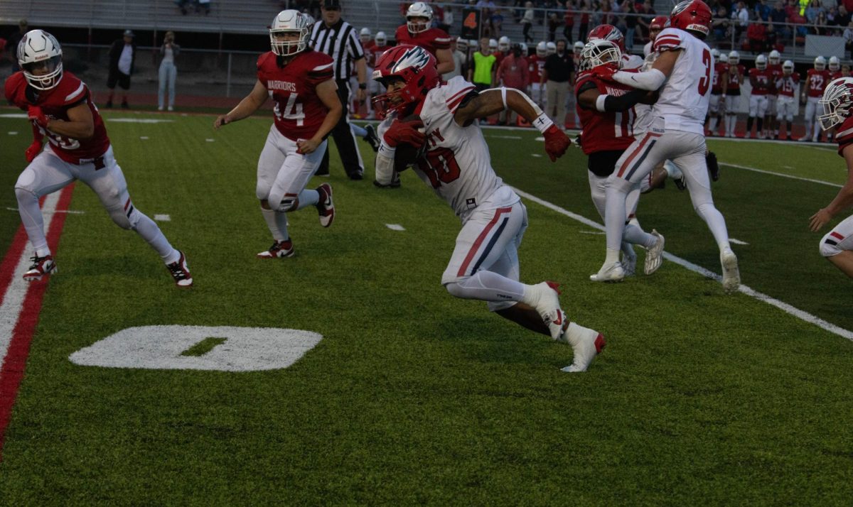 Jaylen Mack wearing wrist tape, turf tape, and ankle spats.