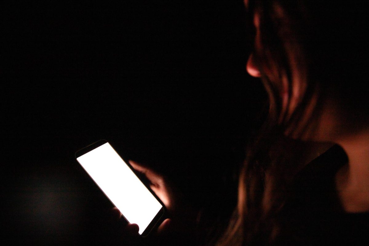 Calleigh Blaine (9) stares at her phone. Teens struggle putting their phones down and this can lead to mental stress. 