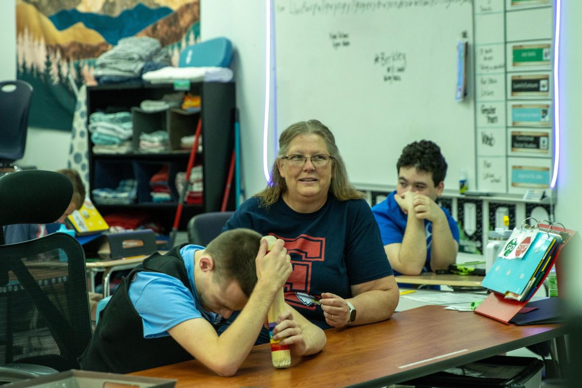 New teacher Melissa Koch dancing to a video with her students on 9.12.24