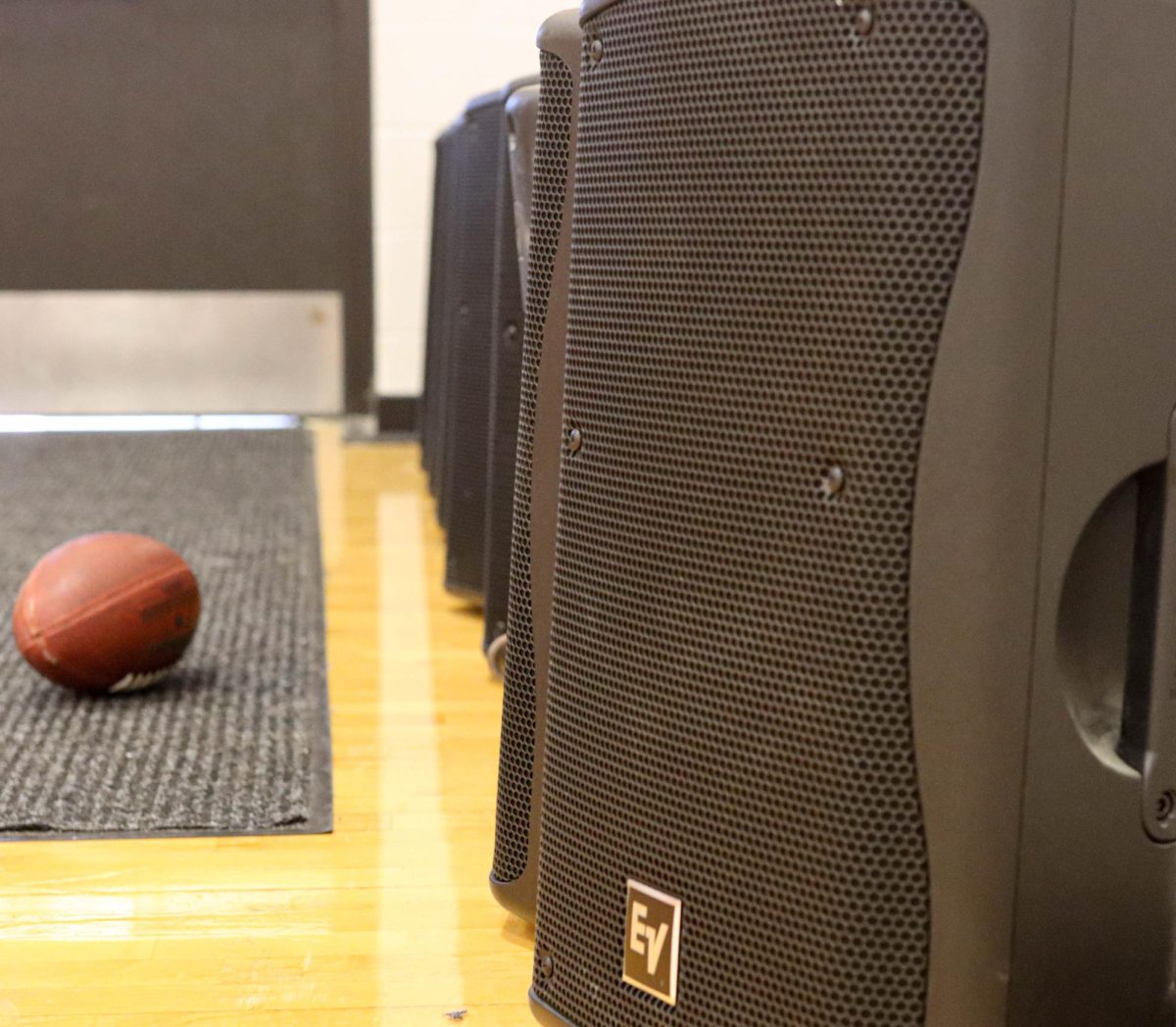 The old speakers sit in the corner of the gym collecting dust.