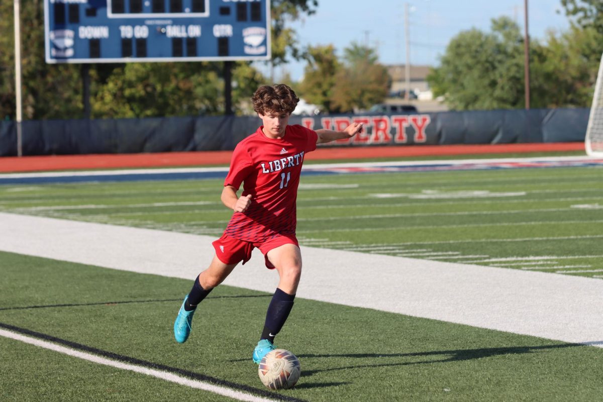 James Good (9) passes ball to teammate against Francis Howell North.