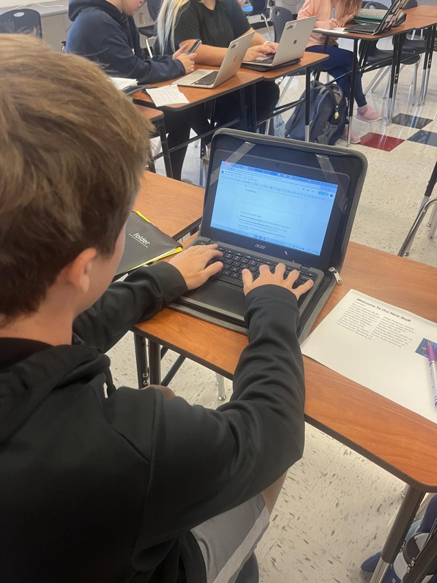 Bradley Hudson (12) types on his computer in class.