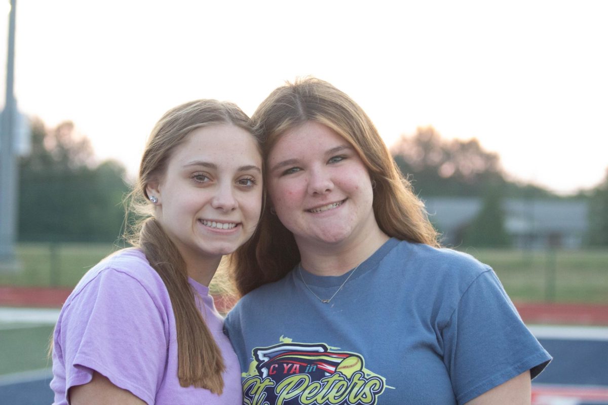 Smiling for the camera, Natalie Zeman and Brooke Phillips show all smiles during senior sunrise.