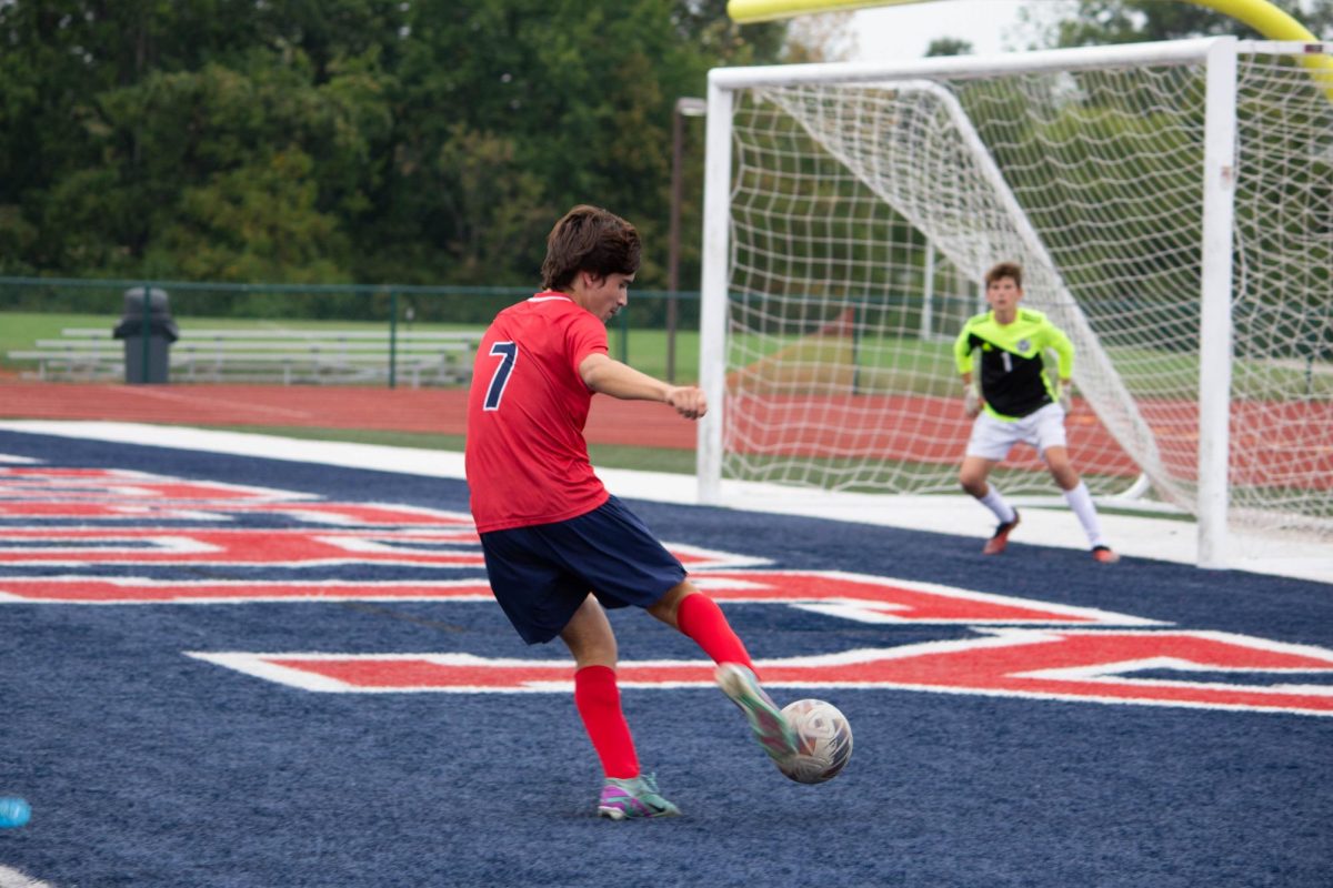 Kaelen Homar takes a shot at the Francis Howell Central goal during the first half.