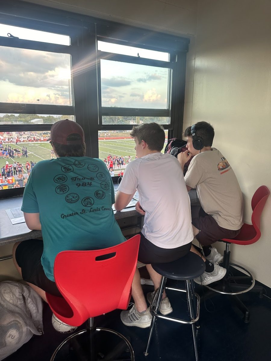 Wesley Bartlow (10), Mason Molitor (11) and Braden Altrup (12) broadcast the first quarter of the North Point football game. 