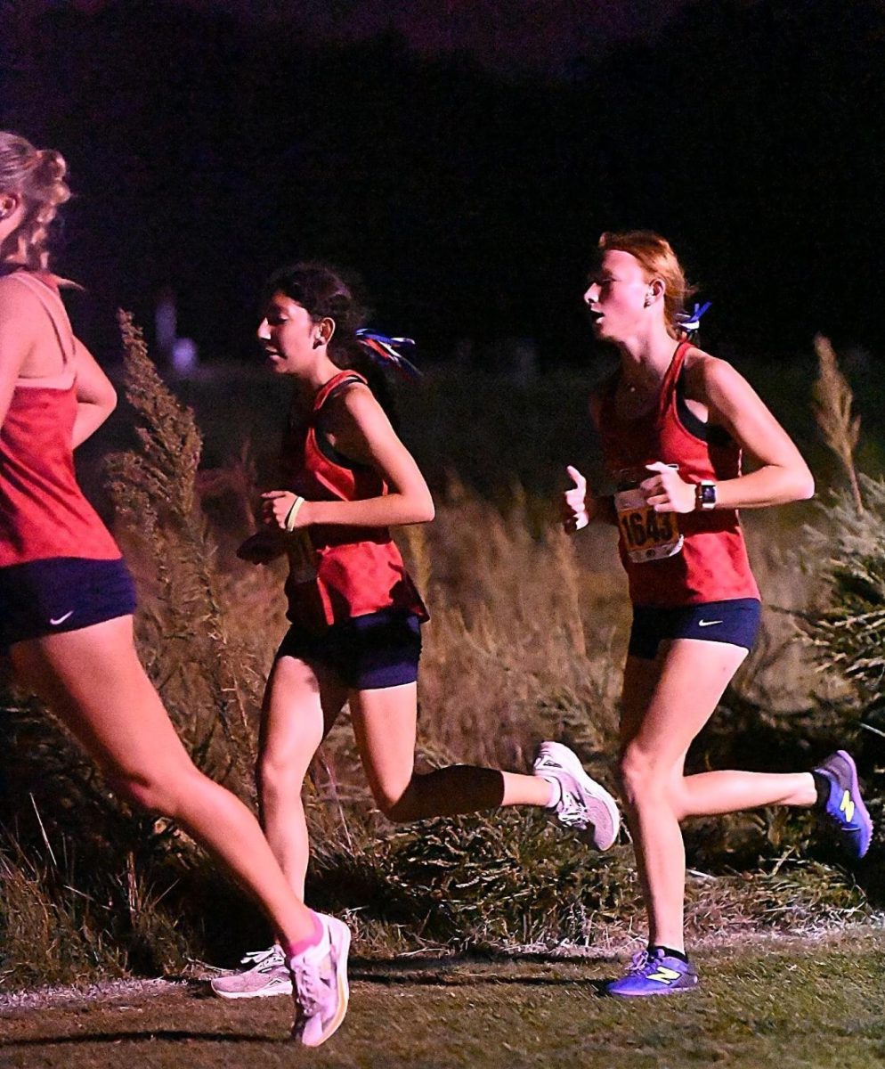 MJ Fleming (11), Ashley Saucita (10), and Ella Judge (9) run at the Gans Creek Classic.