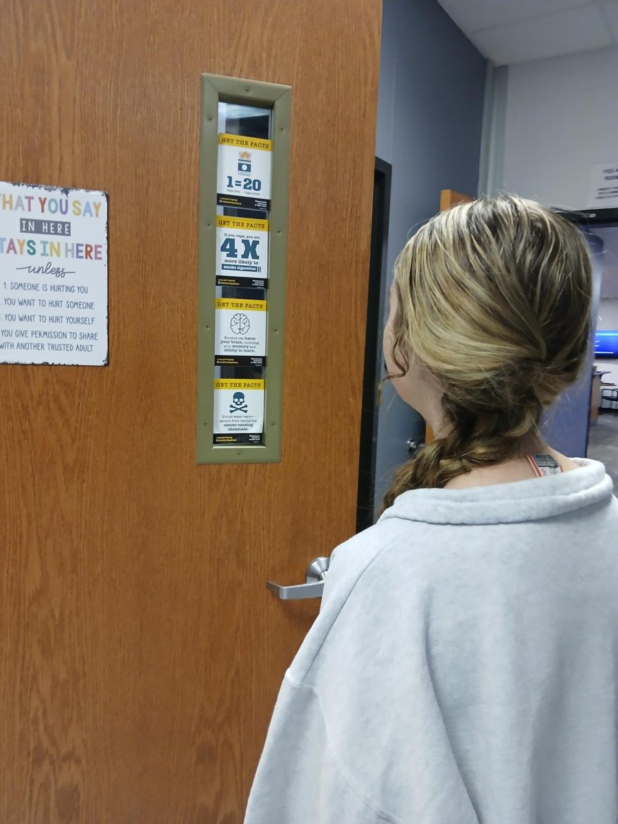 Payton Unnerstall (10) views the causes and effects of e-cigarettes outside of the nurse's office.