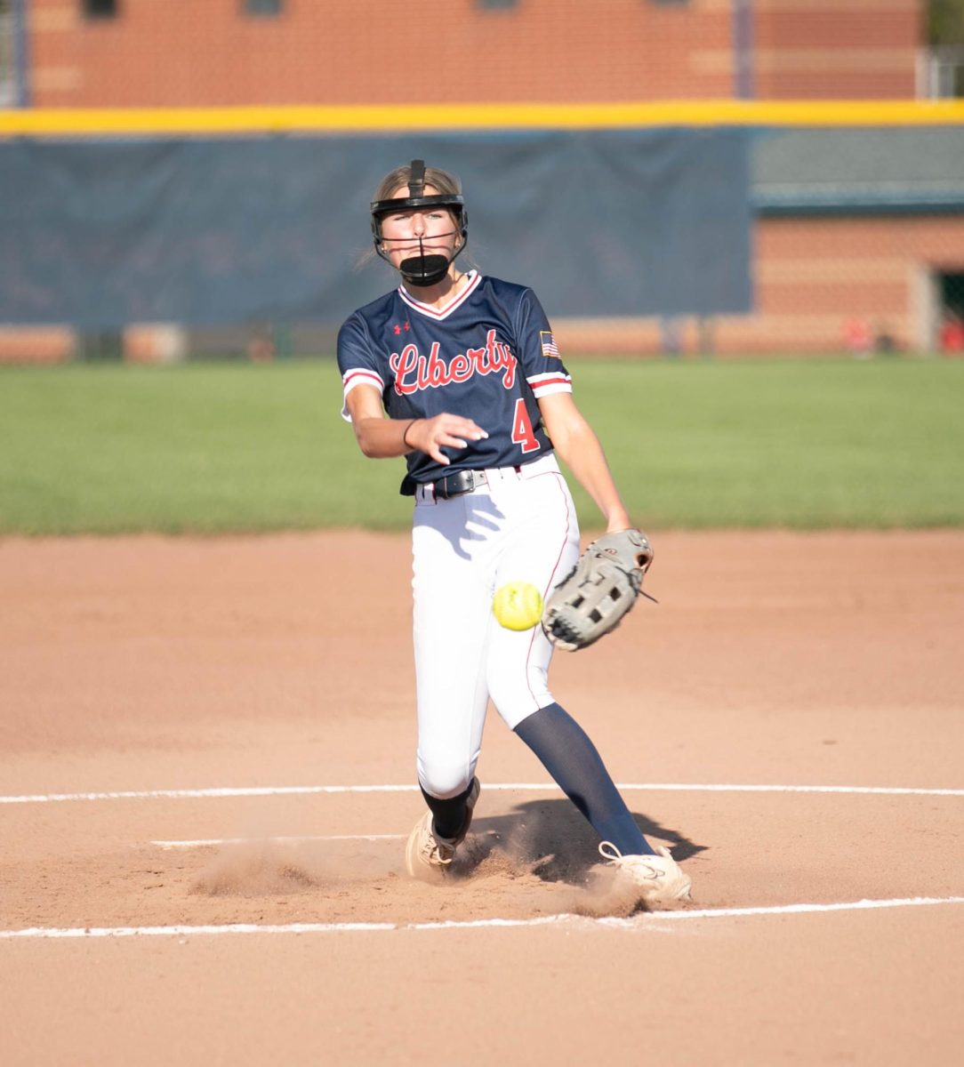 Kate Clanton (11) pitches the ball to Parkway South player during game.