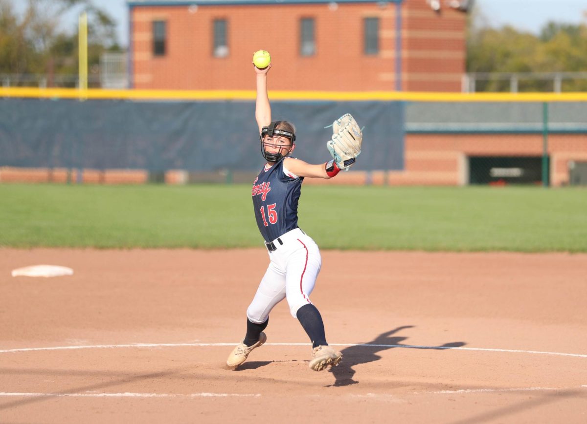 Kiersten York (12) steps forward and swings her right arm to pitch the ball during game against Parkway South.