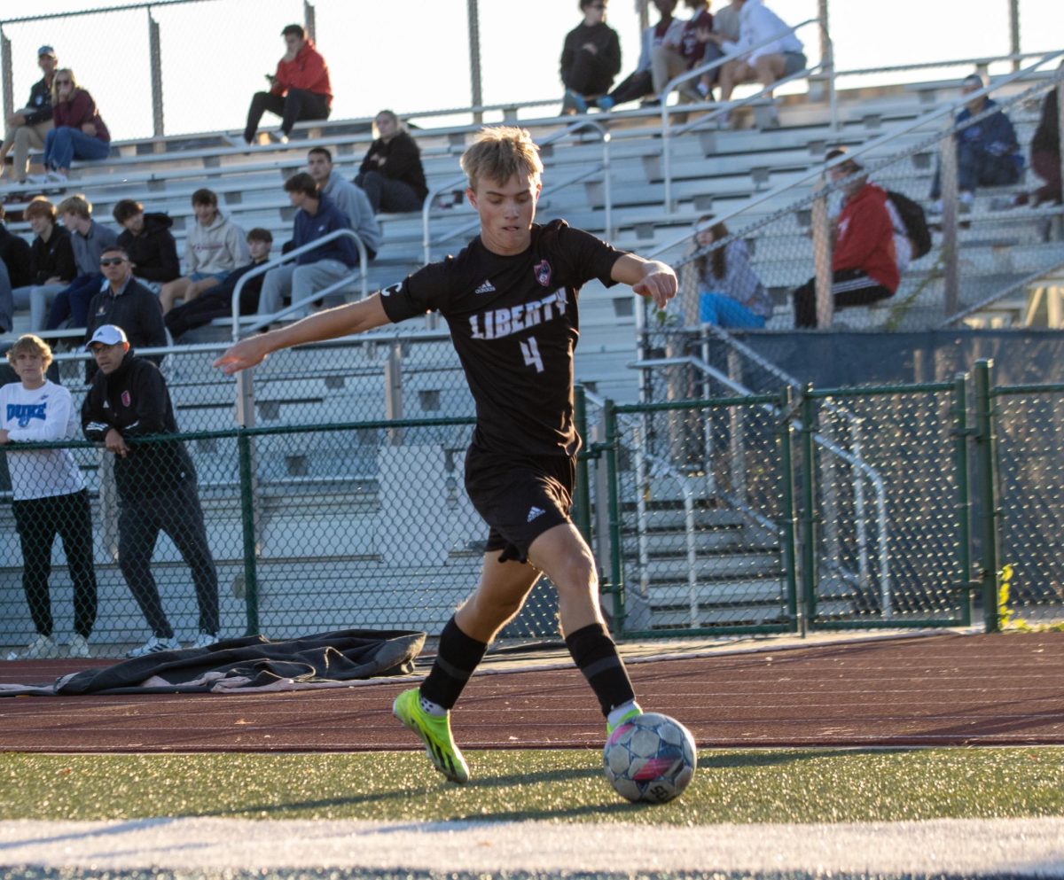 Dylan Handlan (12) gets ready to cross the ball into the box. 