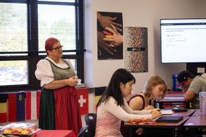 German teacher Ms. Elder talks to the Delta Epsilon Phi organization during meeting on Sept. 26.