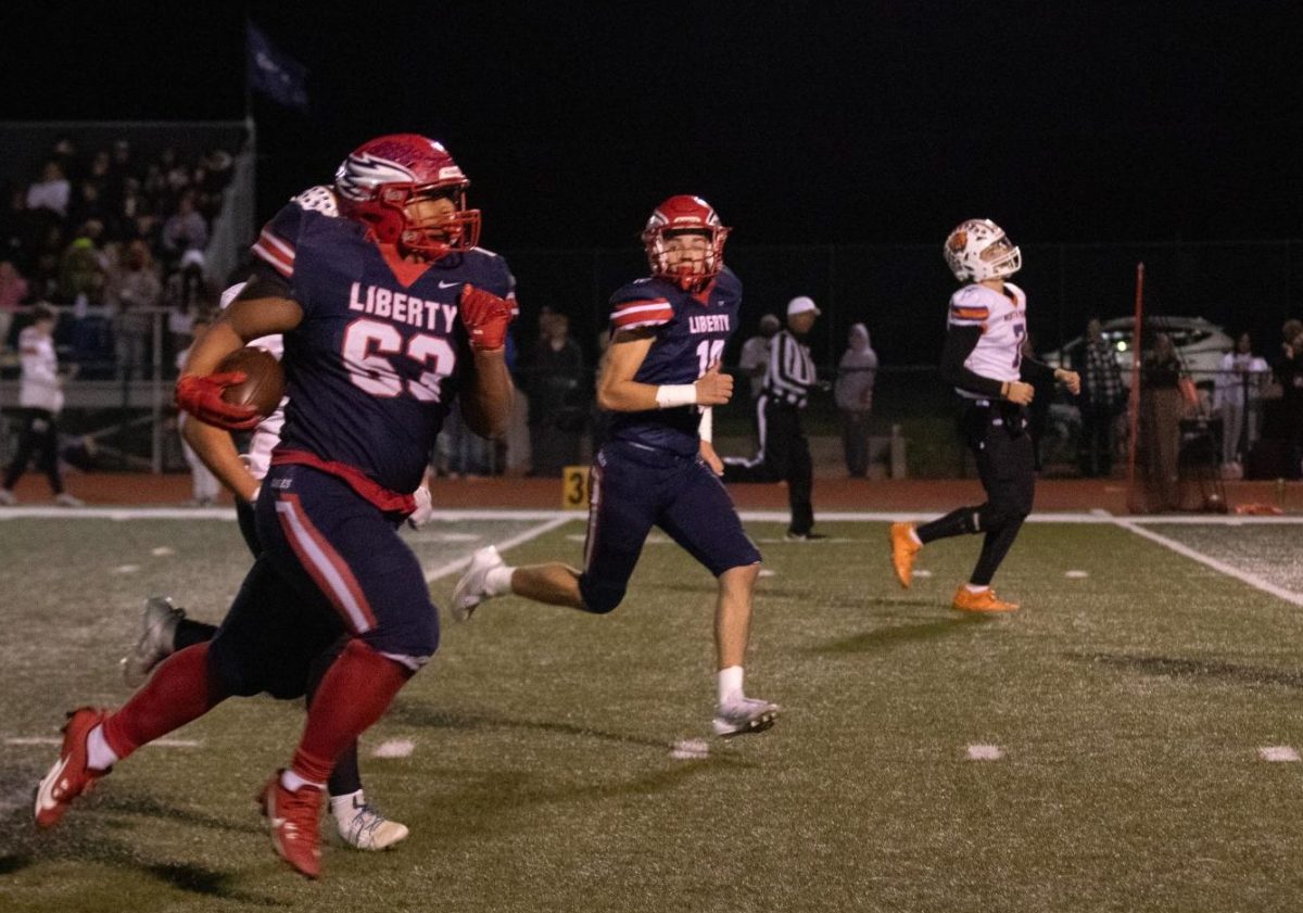 CJ McClain (10) returns a fumble downfield in the second half. The Eagles defense shut out the North Point offense in the first two quarters. 