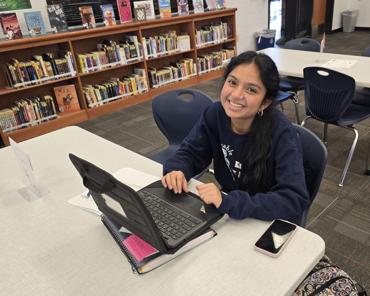 Deveshisai Chitturi (10) works on assignments for her AP classes in the library.