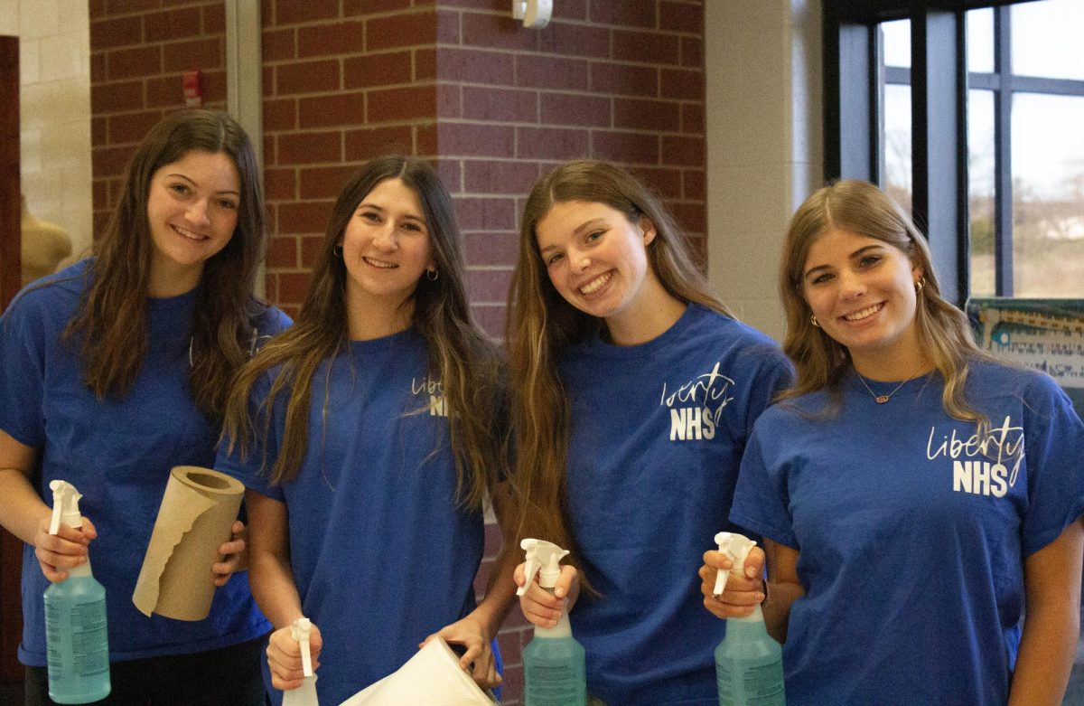 Team of NHS students, preparing to help clean the windows. 