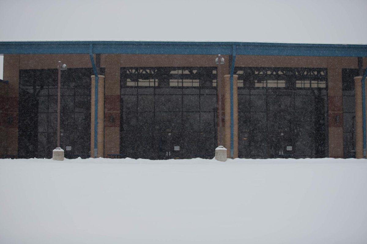 Snow blankets the ground outside behind the Liberty cafeteria. 