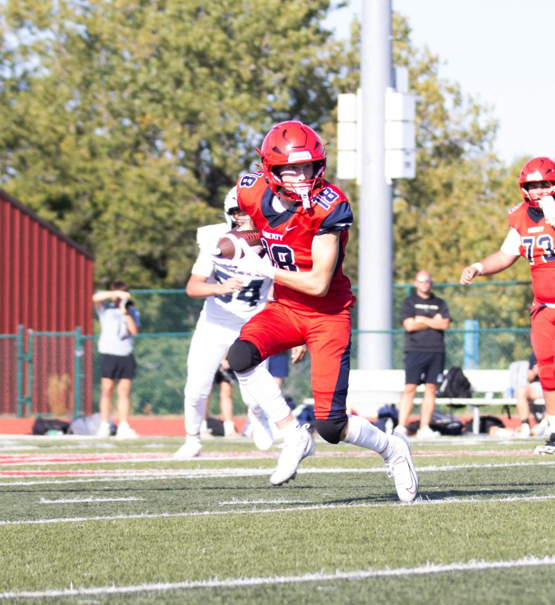 Kellan Harris runs upfield to get the first down. 