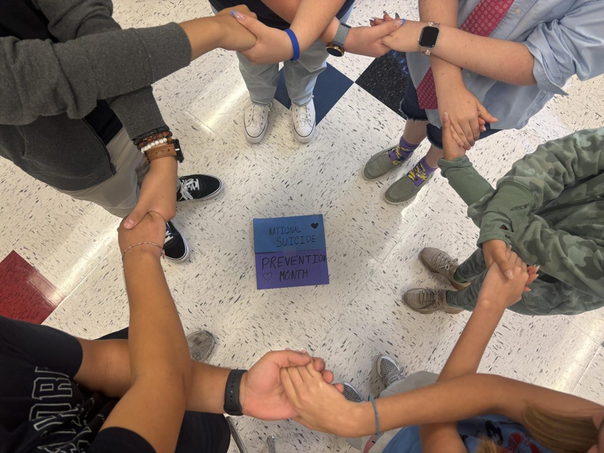 Students gather to bring awareness to September's National Suicide Prevention Month.