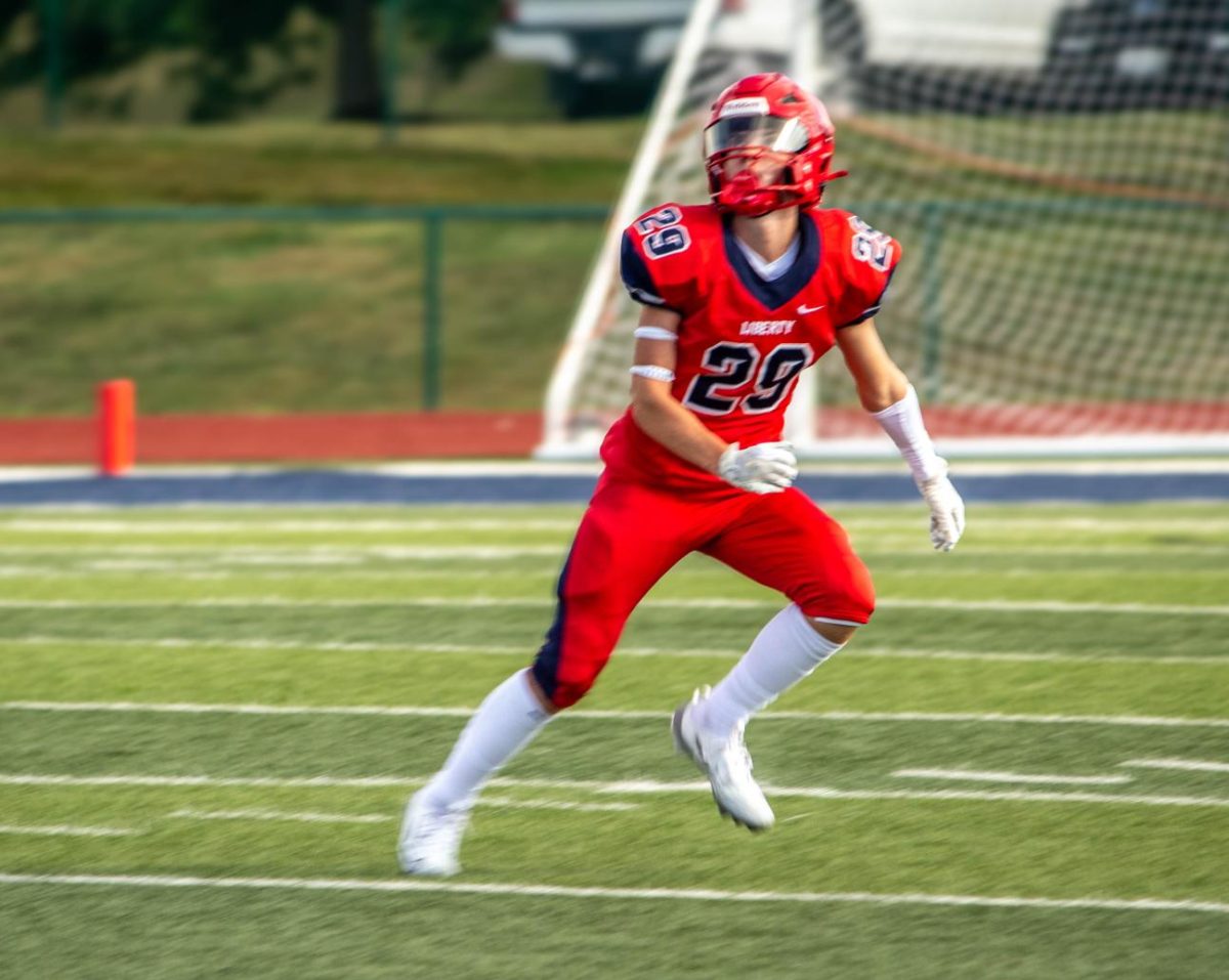 Rory McGowen (9) positions himself to catch a kick in the third quarter of the game. During the third quarter, Howell Central was up by six points until Liberty took the lead.