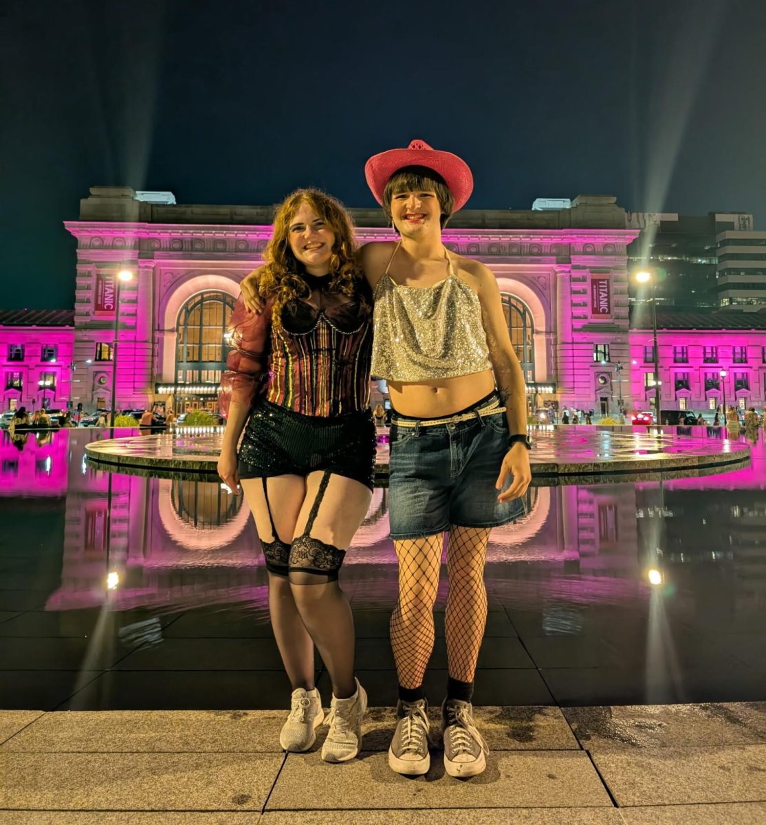 Louis Stoyanov (12) poses outside of a building lite pink, after the show ended. "So many of the cities lights were pink during the night, and it made the whole city seem like it welcomed Chappell, and gave her the spotlight for her time there," Stoyanov said.