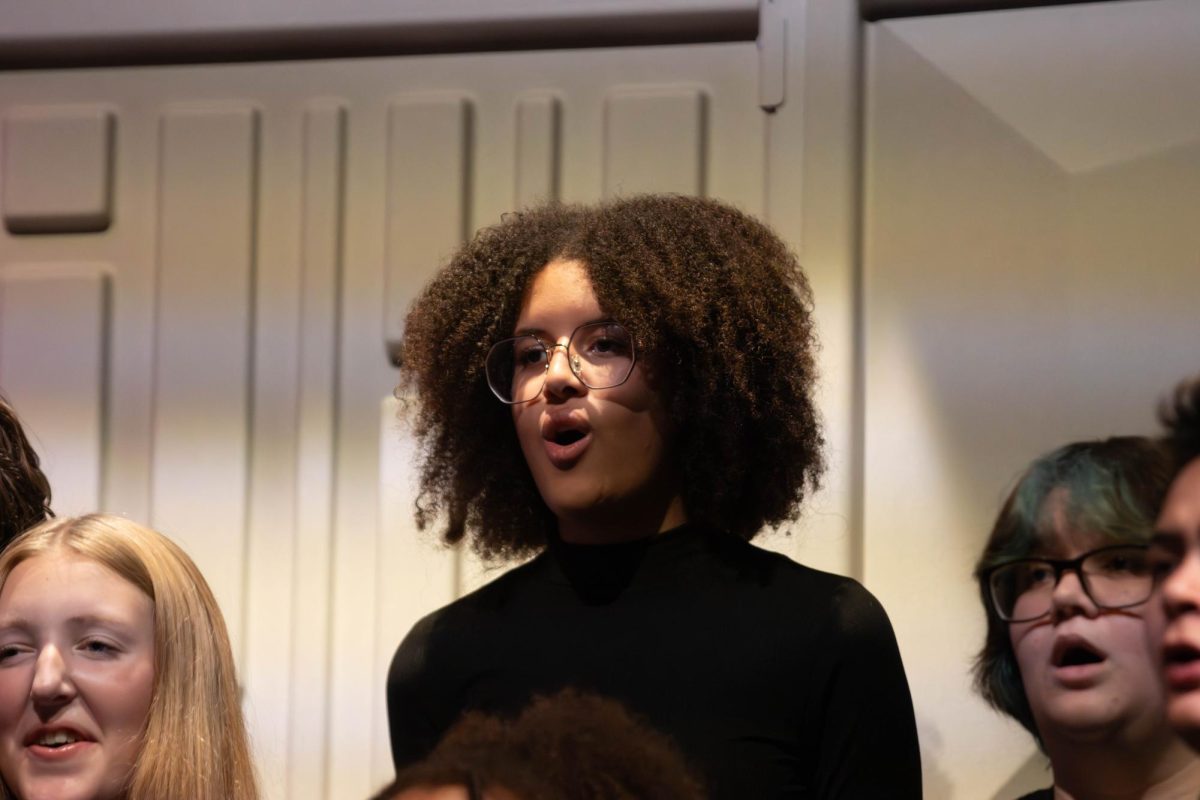 Kohra Salmond (9) performs as part of the concert choir. 