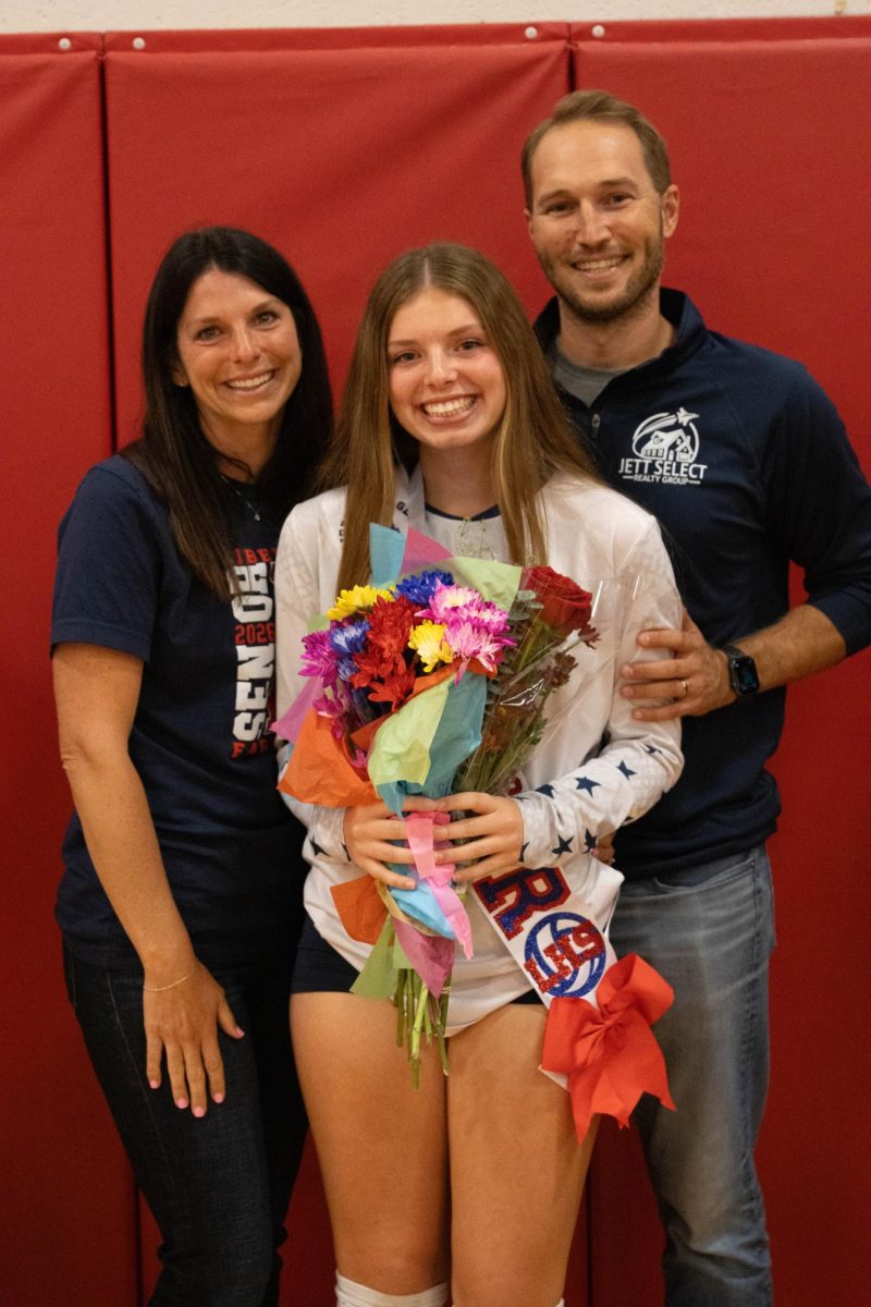 Hailey Jett (12) and family pose for photo.