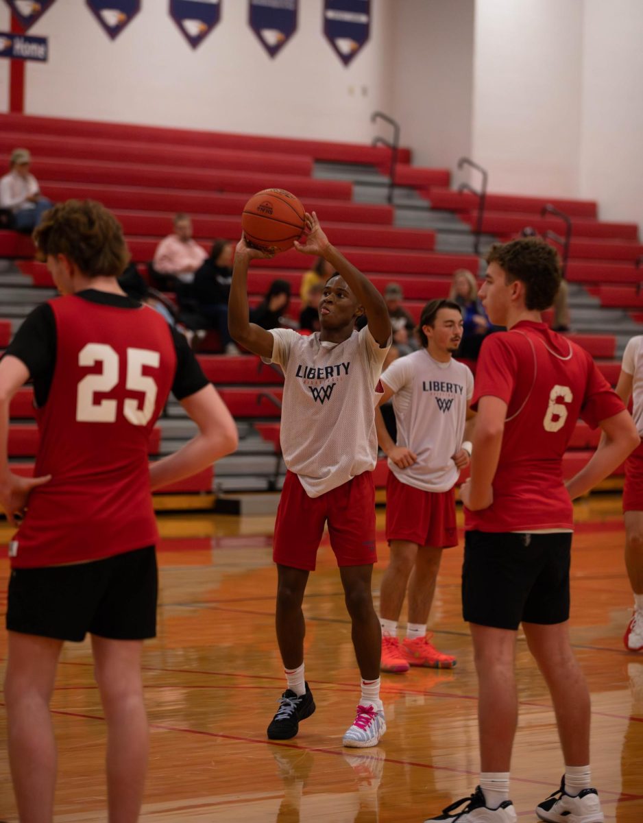 Curron Price (11) shoots a free throw.