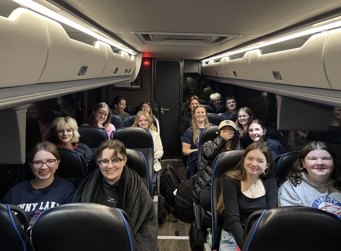 Publications students on the bus the morning of going to Nashville before picking up students at Ladue High School.