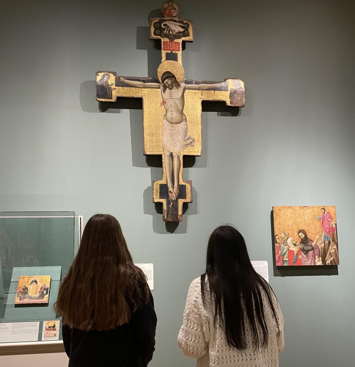 Hadley Kendall (11), on the left, and Avery Huebbe (11), on the right, look at art at the St. Louis Art Museum. 