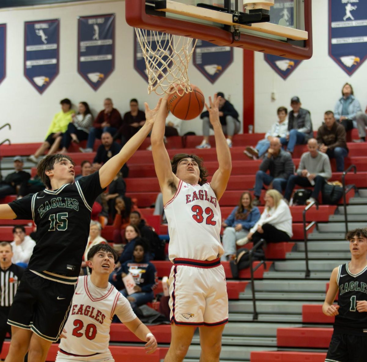 Landon Johnson #32 rebounds the ball after a shot. 