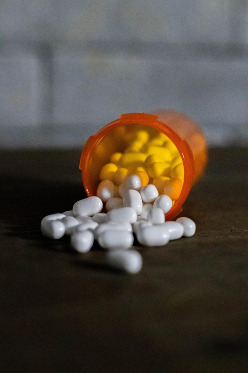 Prescribed medications can help with anxiety, depression, and ADHD. *This is a staged photo with fake drugs pictured.