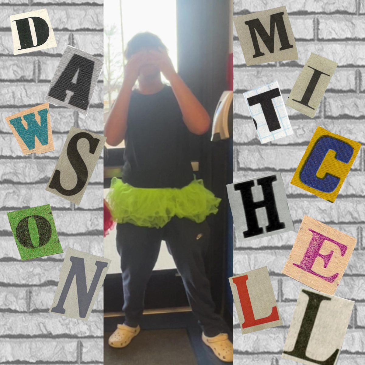 Dawson Mitchell(10) posing with a neon green tutu