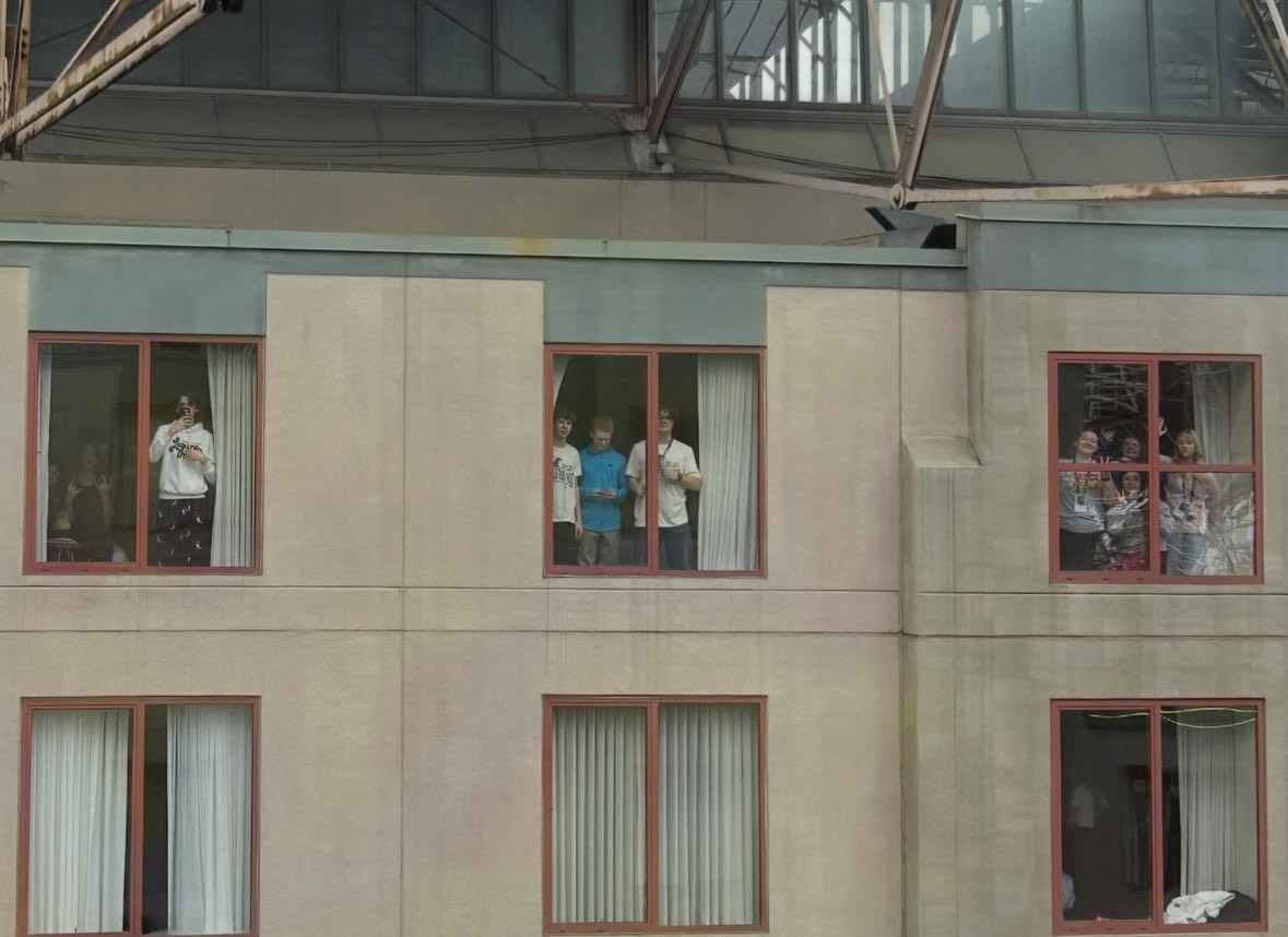 Liberty Thespians wave at each other from across their hotel through their windows- something that became popular at the conference.