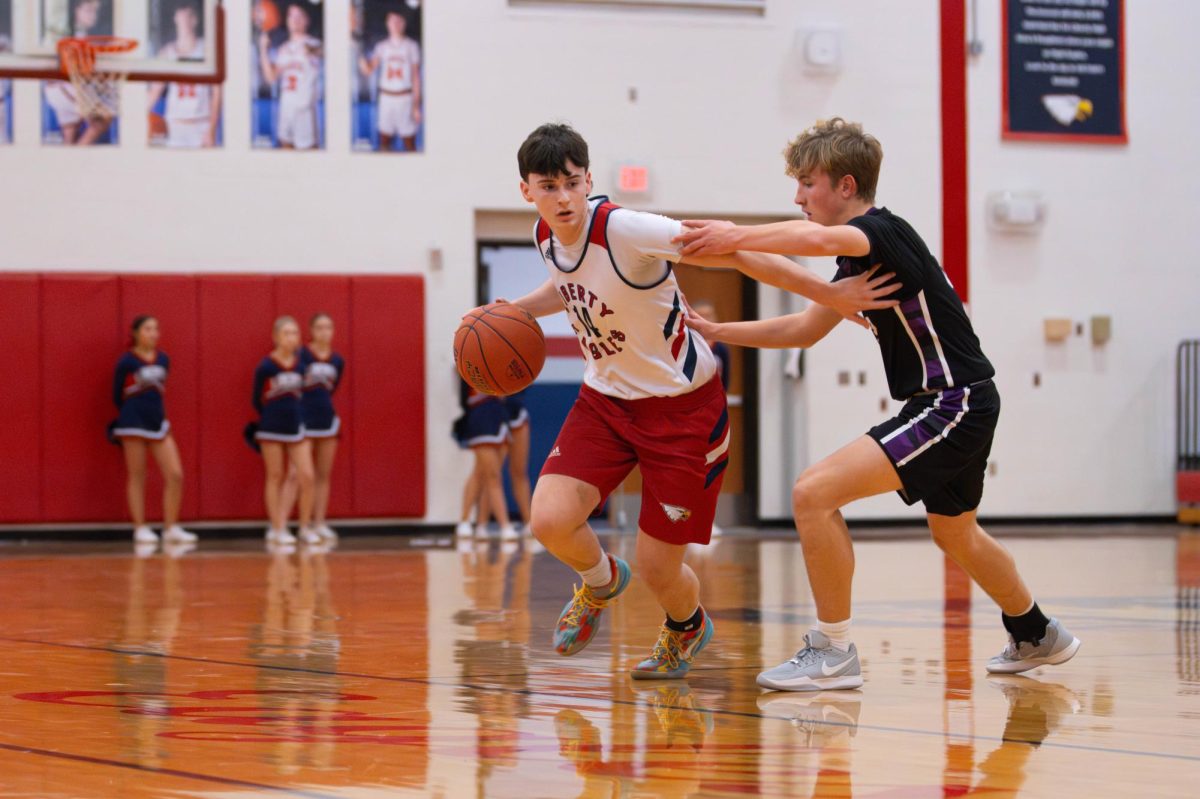 Gavin Zebelman (9) dribbles the ball during a game against Zumwalt West. 
