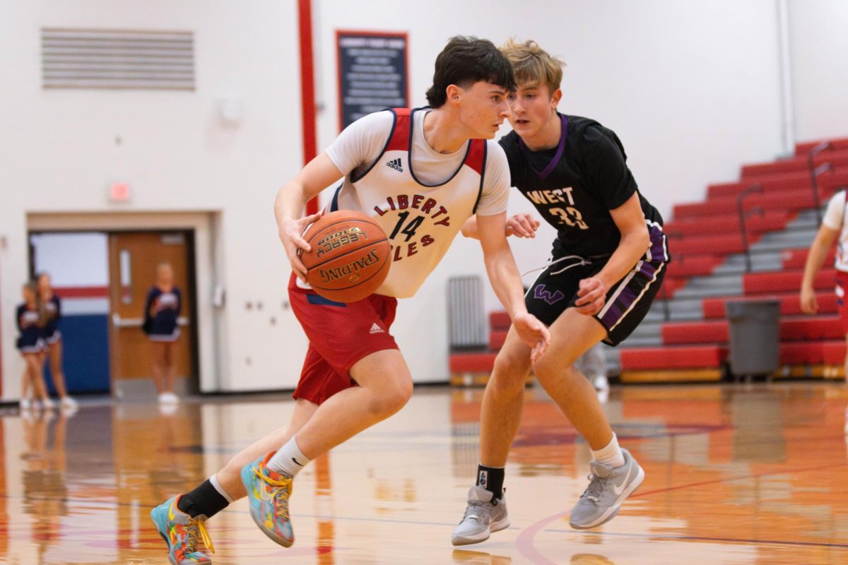 Gavin Zebelman (9) dribbles the ball during a game against Zumwalt West. 