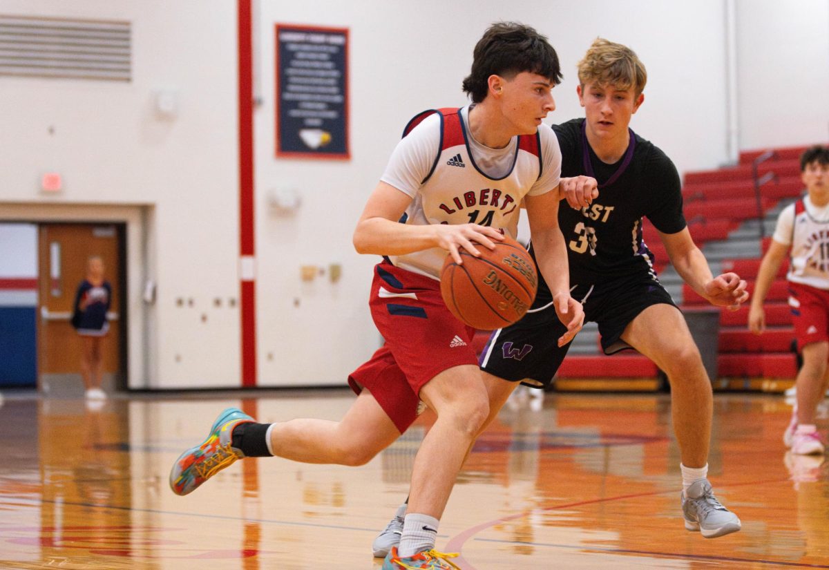 Gavin Zebelman (9) dribbles the ball during a game against Zumwalt West. 