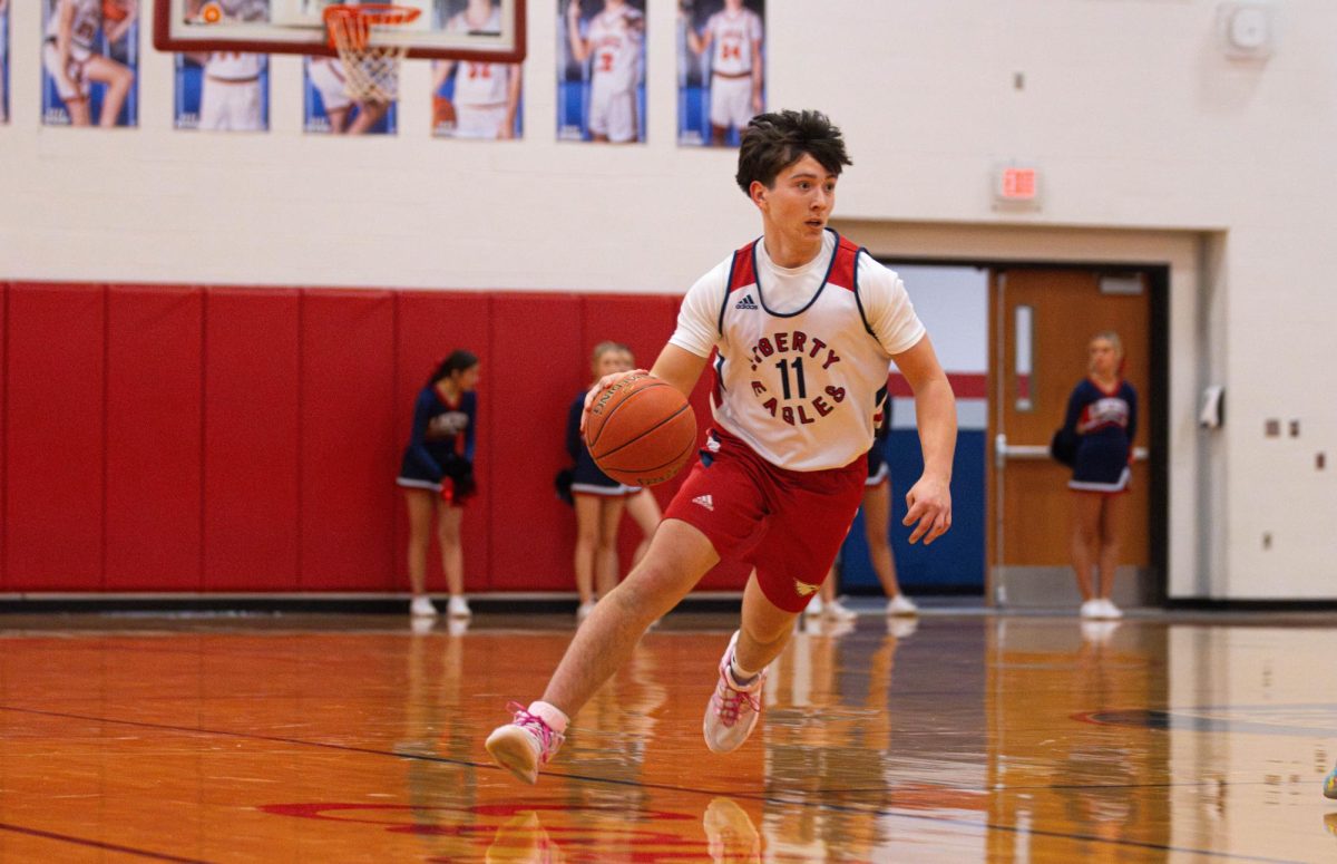 Liam Heath (9) dribbles the ball during a game against Zumwalt West. 