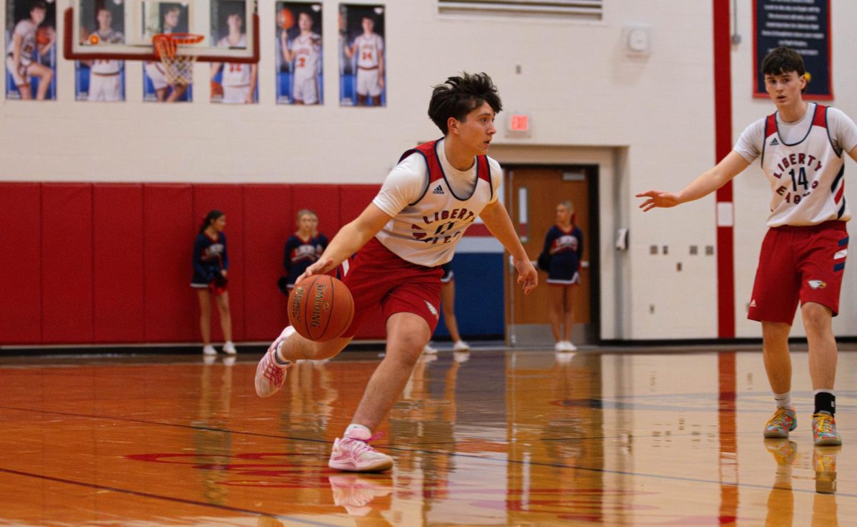 Liam Heath (9) dribbles the ball during a game against Zumwalt West. 