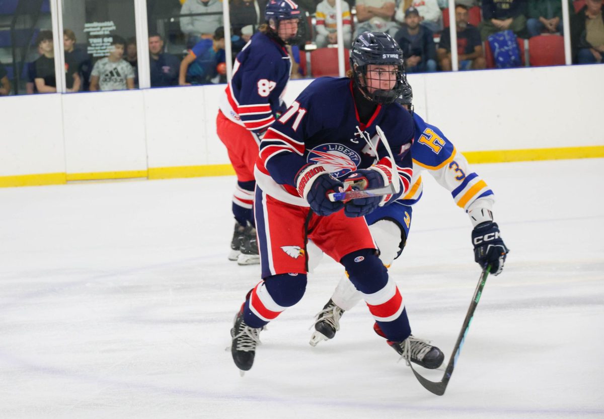 Connor Casella (11) looks towards teammate before colliding with Francis Howell player during the preseason.