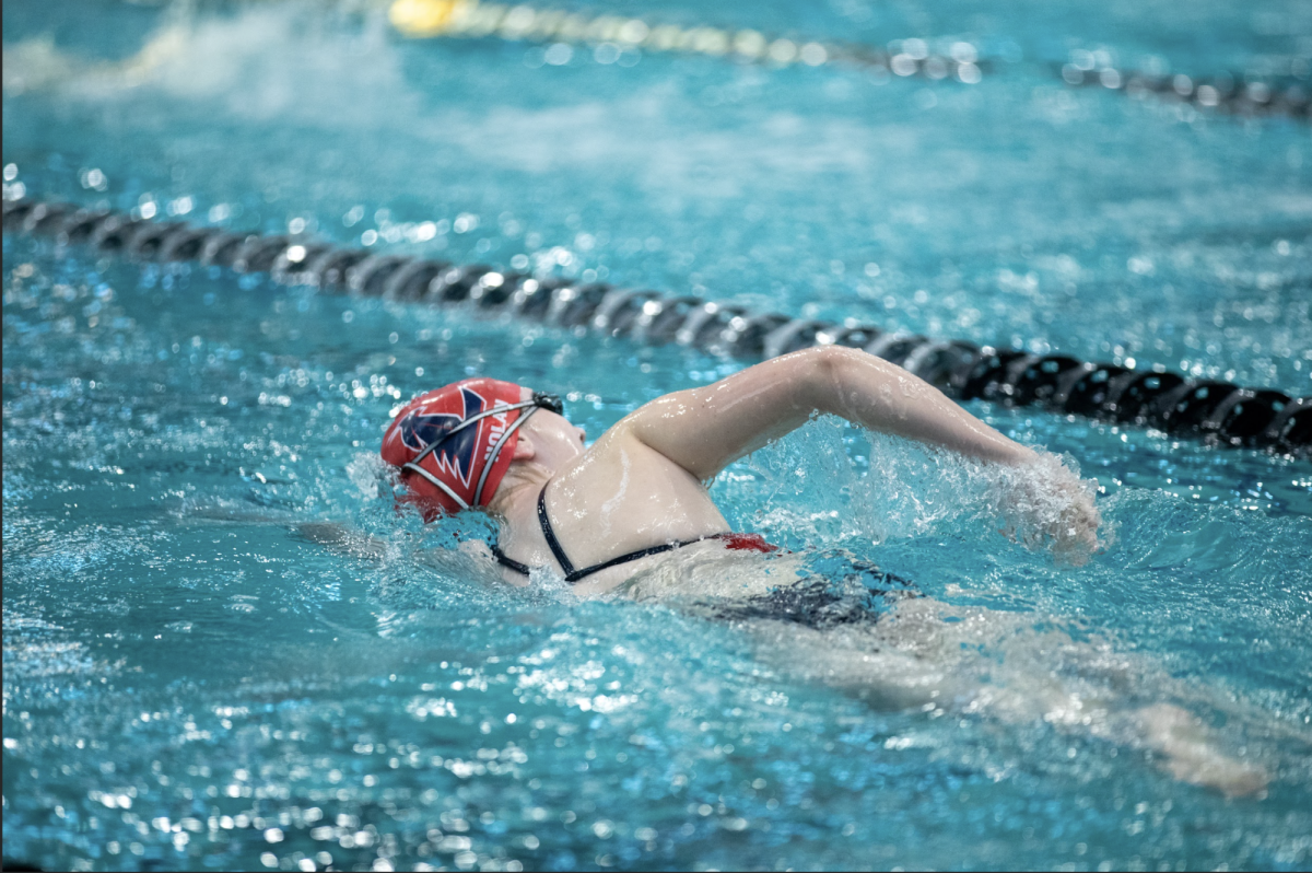 Lillian Nolan (10) swims as as fast as she can in a meet to get a better time.