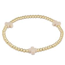One of enewton's most sold pieces, the Signature Cross Bracelet