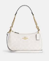 The Teri Shoulder Bag in signature canvas, one of the most popular colors.
